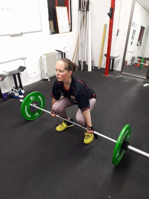 Sarah preparing to lift